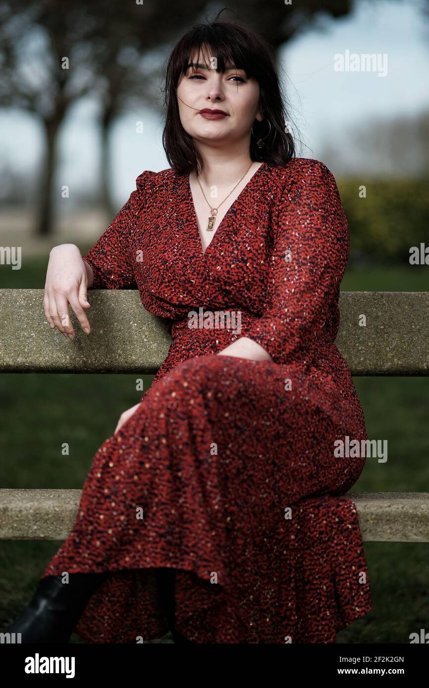 Brunette woman red lipstick hi-res stock photography and images