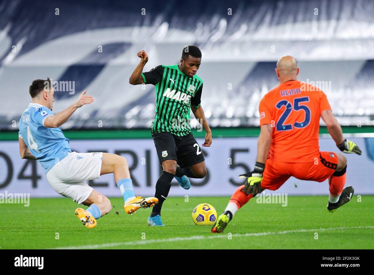 Hamed Junior Traore Of Sassuolo C Kicks The Ball Under Pressur Of Gil Patricio Gabarron R And The Goalkeeper Of Lazio Pepe Reina L During The Italian Championship Serie A Football Match Hamed Junior Traore Of Sassuolo C Kicks The Ball Under Pressur Of Gil Patricio Gabarron R And The Goalkeeper Of Lazio Pepe Reina L During The Italian Championship Serie A Football Match