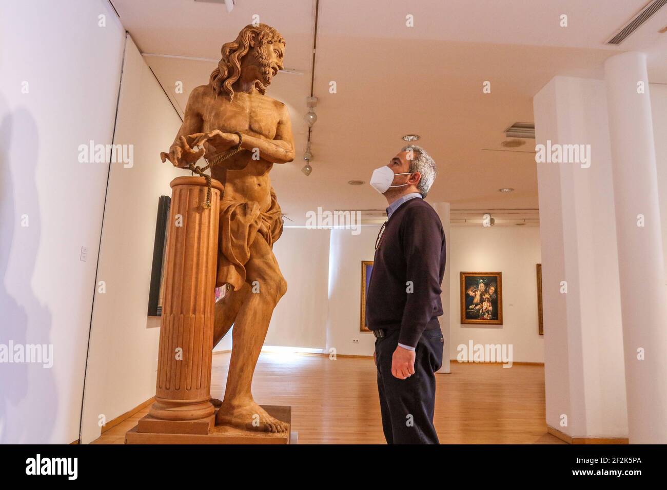 Malaga, Spain. March 12, 2021: March 12, 2021 (Malaga) to collective exhibition 'The Current Sacred Art in Malaga', which will accompany that of Azaustre, is composed of works by 12 prestigious artists. Visitors can admire the creations of RaÃºl Berzosa, Eugenio Chicano, Leonardo FernÃ¡ndez, Manuel Higueras, Antonio Montiel, Pepe Palma, Fernando Prini, Conchi Quesada, Félix Revello, Suso de Marcos, José MarÃ-a Ruiz Montes and Juan Vega. Nine painters and draughtsmen, and three sculptors (imagers), who offer the public part of the panorama of religious art in Malaga (Credit Image: © Lorenzo Car Stock Photo