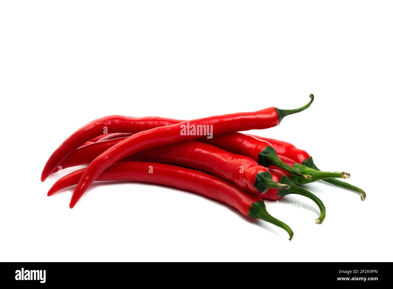 Red fresh chili peppers isolated on white background Stock Photo