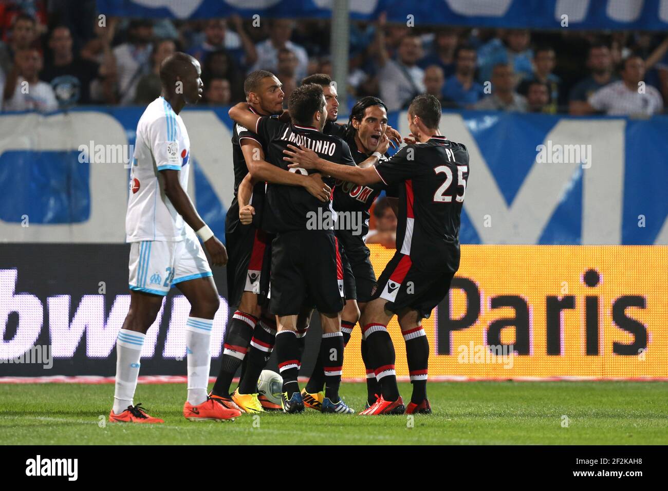 Football - French Championship 2013/2014 - Ligue 1 - Olympique de Marseille v AS Monaco on September 1 , 2013 in Marseille , France - Photo Manuel Blondeau / AOP PRESS / DPPI - Radamel Falcao of Monaco (2nd from R) celebrates with his teammates after scoring his sides first goal Stock Photo