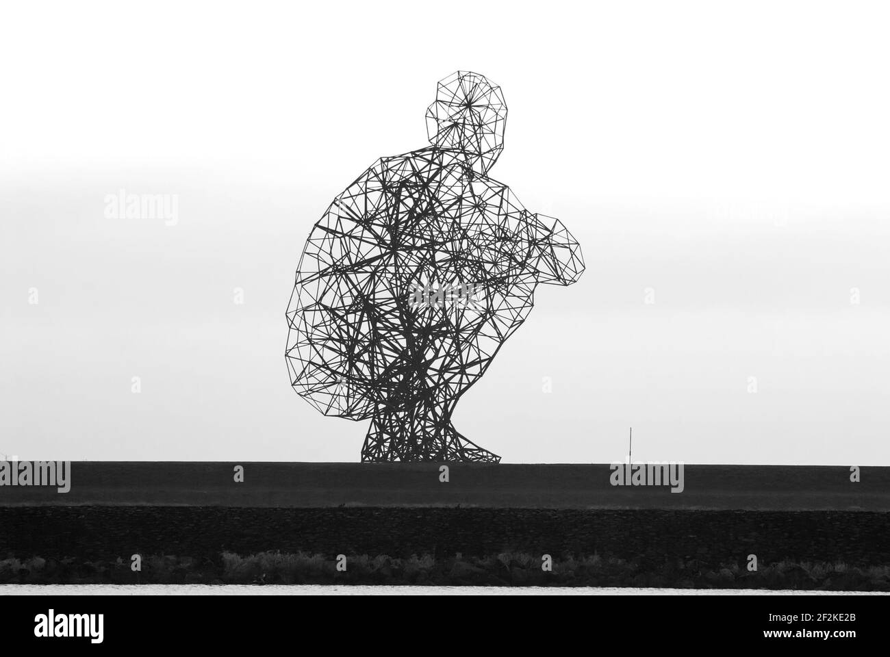 Antony Gormley's sculpture called Exposure on sea dyke, Lelystad