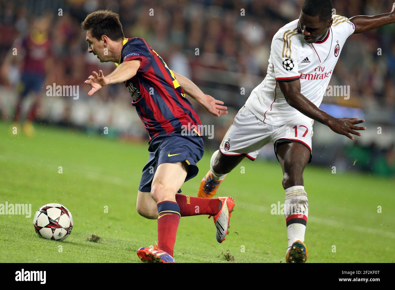 Football - UEFA Champions League 2013/2014 - Group Stage - Group H - FC Barcelona v Milan AC on November 6, 2013 in Barcelona , Spain - Photo Manuel Blondeau / AOP PRESS / DPPI - Lionel Messi of FC Barcelona duels for the ball with Cristian Zapata of AC Milan Stock Photo