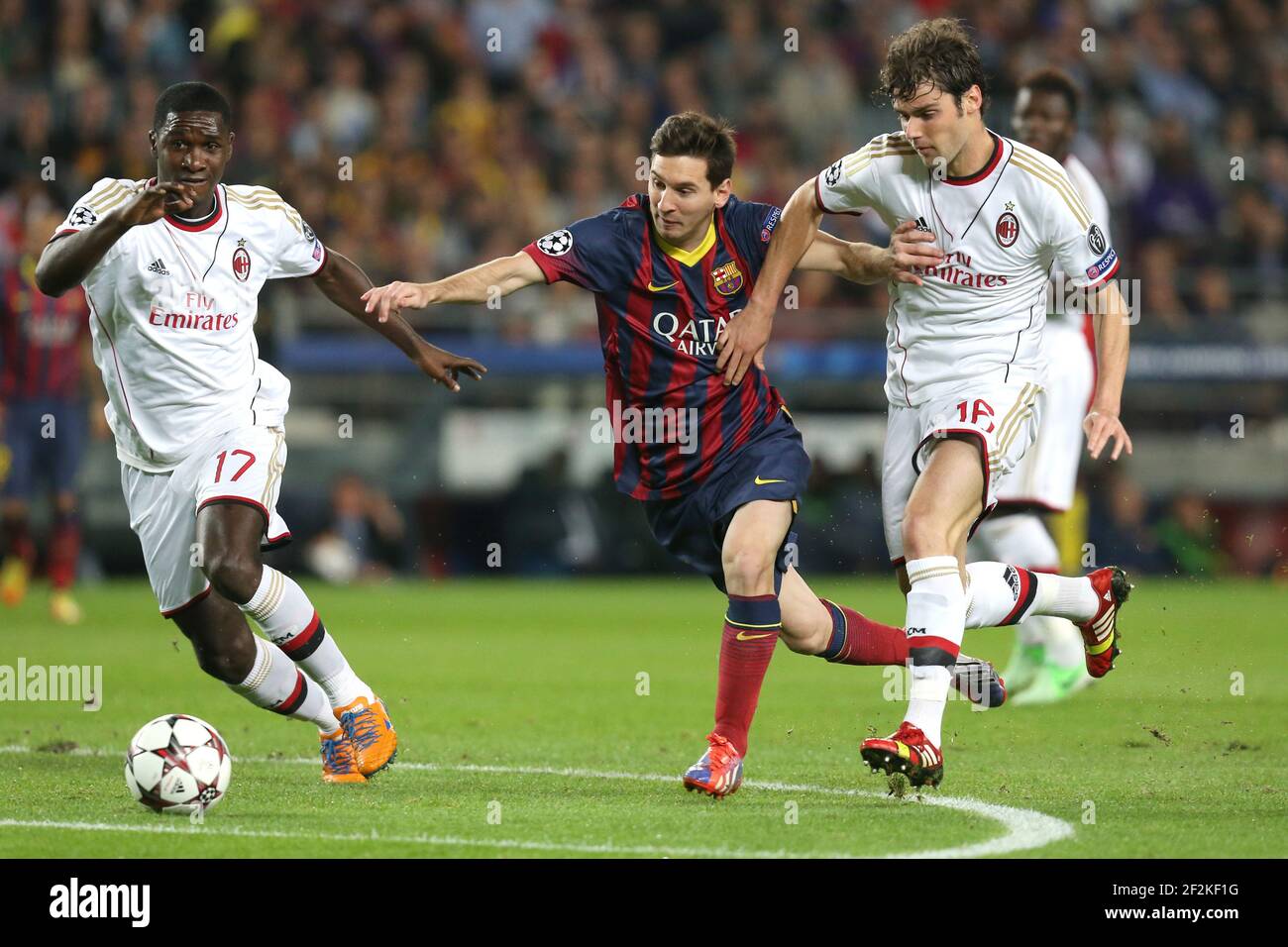 Football - UEFA Champions League 2013/2014 - Group Stage - Group H - FC Barcelona v Milan AC on November 6, 2013 in Barcelona , Spain - Photo Manuel Blondeau / AOP PRESS / DPPI - Lionel Messi of FC Barcelona duels for the ball with Andrea Poli and Cristian Zapata of AC Milan Stock Photo