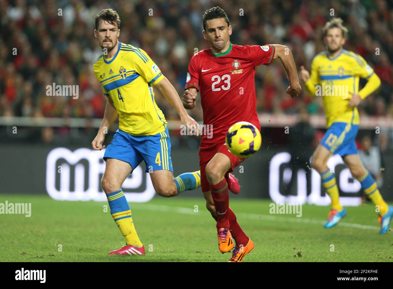Football - FIFA World Cup 2014 - Qualifiying - Play Offs - 1st Leg - Portugal v Sweden on November 15, 2013 in Lisbon , Portugal - Photo Manuel Blondeau / AOP PRESS / DPPI - Helder Postiga of Portugal duels for the ball with Per Nilsson of Sweden Stock Photo