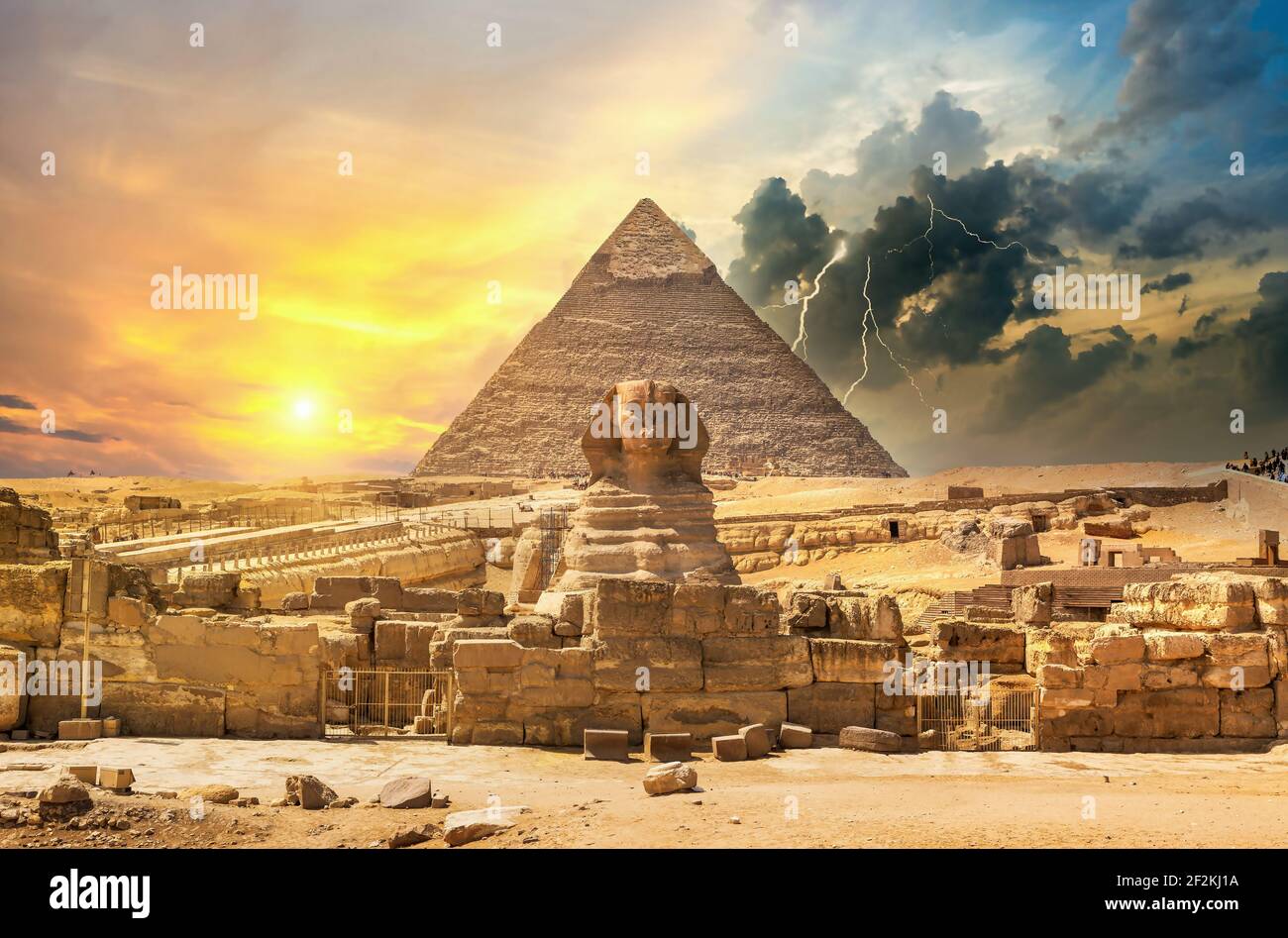 Sphinx and pyramid in the egyptian desert Stock Photo - Alamy