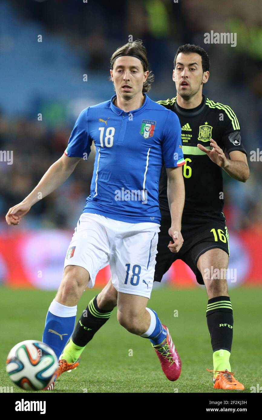 Football - International Friendly Games 2014 - Spain v Italy on March 5, 2014 in Vicente Calderon Stadium of Madrid , Spain - Photo Manuel Blondeau / AOP PRESS / DPPI - Riccardo Montolivo of Italy controls the ball under pressure from Sergio Busquets of Spain Stock Photo