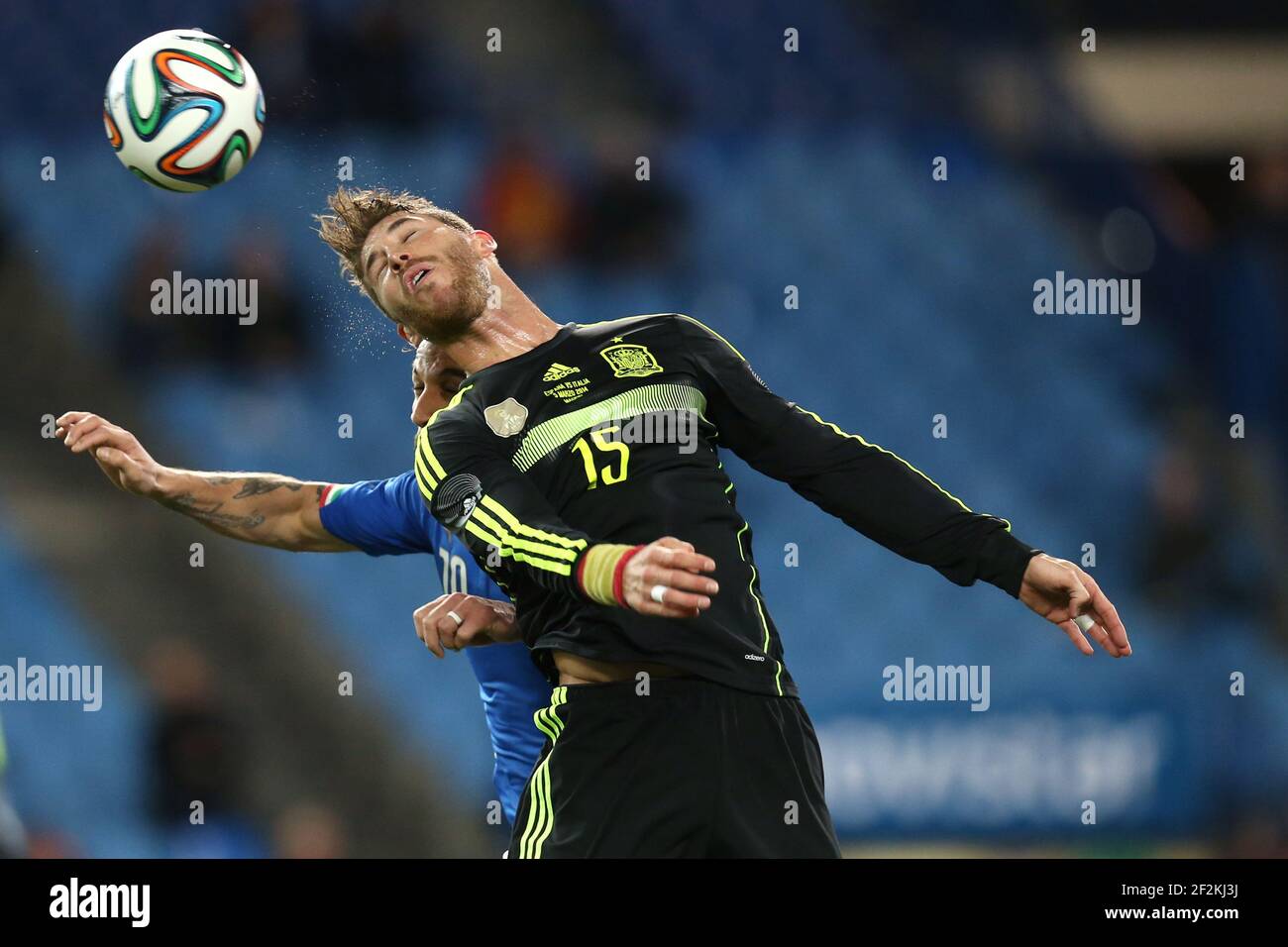Football - International Friendly Games 2014 - Spain v Italy on March 5, 2014 in Vicente Calderon Stadium of Madrid , Spain - Photo Manuel Blondeau / AOP PRESS / DPPI - Sergio Ramos of Spain jumps to win a header with Pablo Osvaldo of Italy Stock Photo