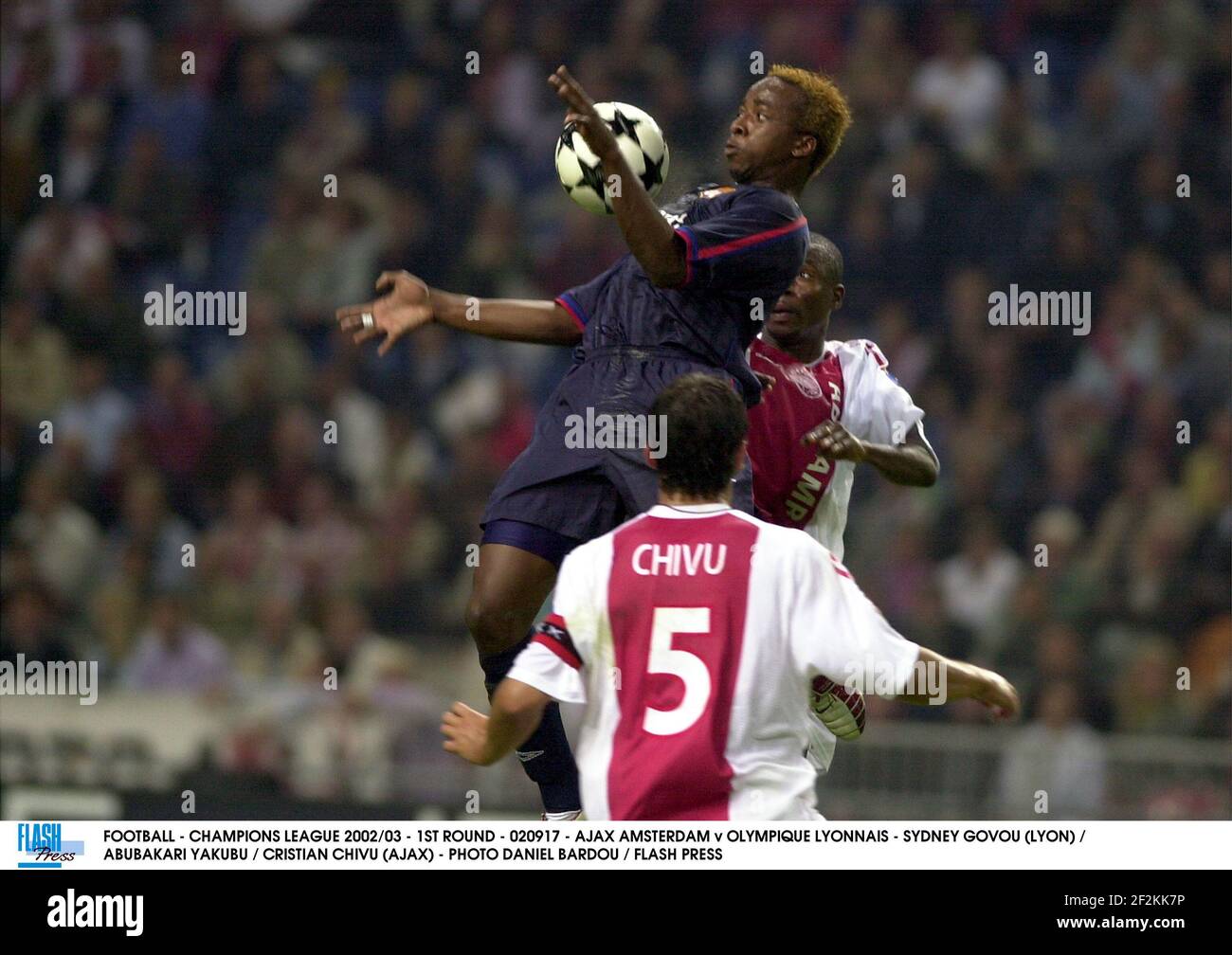 FOOTBALL - CHAMPIONS LEAGUE 2002/03 - 1ST ROUND - 020917 - AJAX AMSTERDAM v  OLYMPIQUE LYONNAIS - JOY ZLATAN IBRAHIMOVIC / CRISTIAN CHIVU (AJAX) - PHOTO  DANIEL BARDOU / FLASH PRESS Stock Photo - Alamy