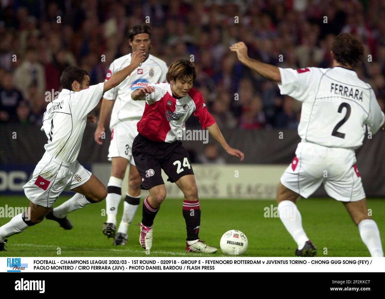 FOOTBALL - CHAMPIONS LEAGUE 2002/03 - 1ST ROUND - 020918 - GROUP E - FEYENOORD ROTTERDAM v JUVENTUS TORINO - CHONG GUG SONG (FEY) / PAOLO MONTERO / CIRO FERRARA (JUV) - PHOTO DANIEL BARDOU / FLASH PRESS Stock Photo