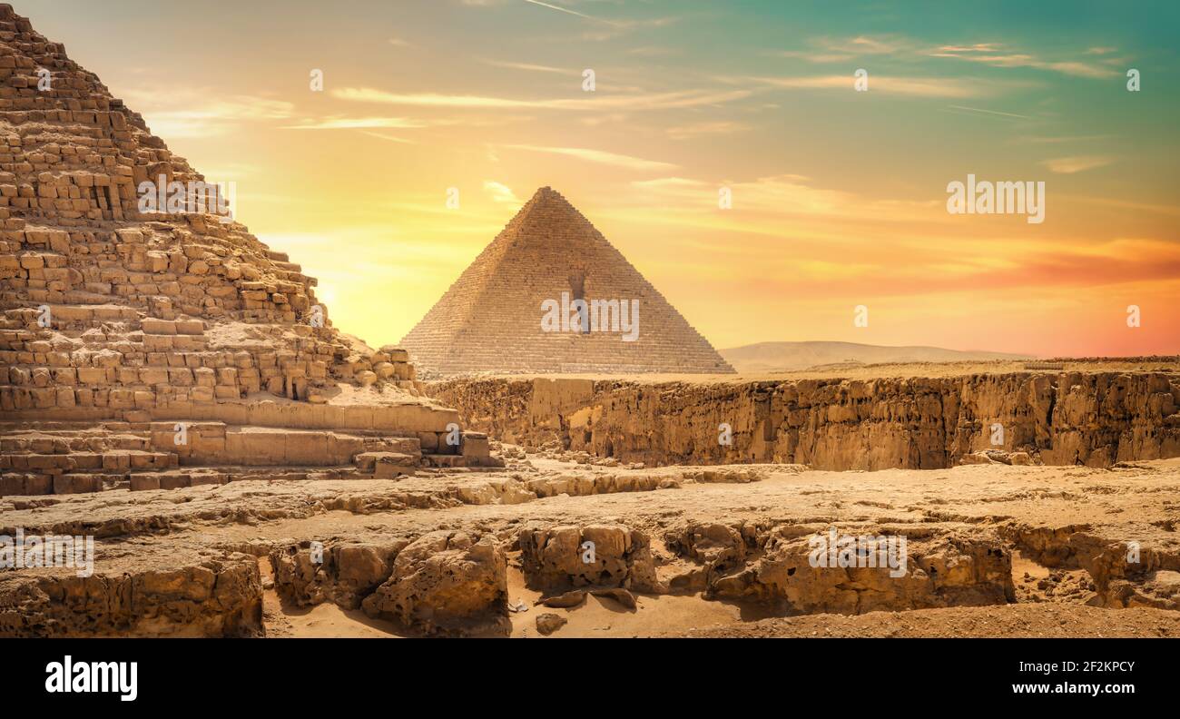 Egyptian pyramid in sand desert and clear sky Stock Photo