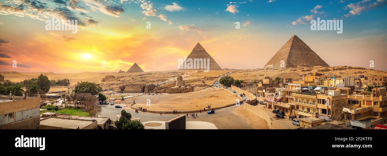 Sphinx and pyramids in the egyptian desert Stock Photo - Alamy