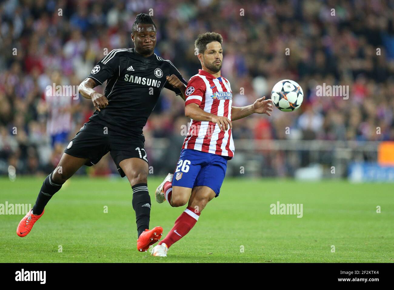 Diego Ribas of Atletico de Madrid duels for the ball with John Obi Mikel of Chelsea FC during the UEFA Champions League 2013/2014 football match semi final, first leg between Atletico Madrid and Chelsea on April 22, 2014 at Vicente Calderon stadium in Madrid, Spain. Photo Manuel Blondeau / AOP Press / DPPI Stock Photo
