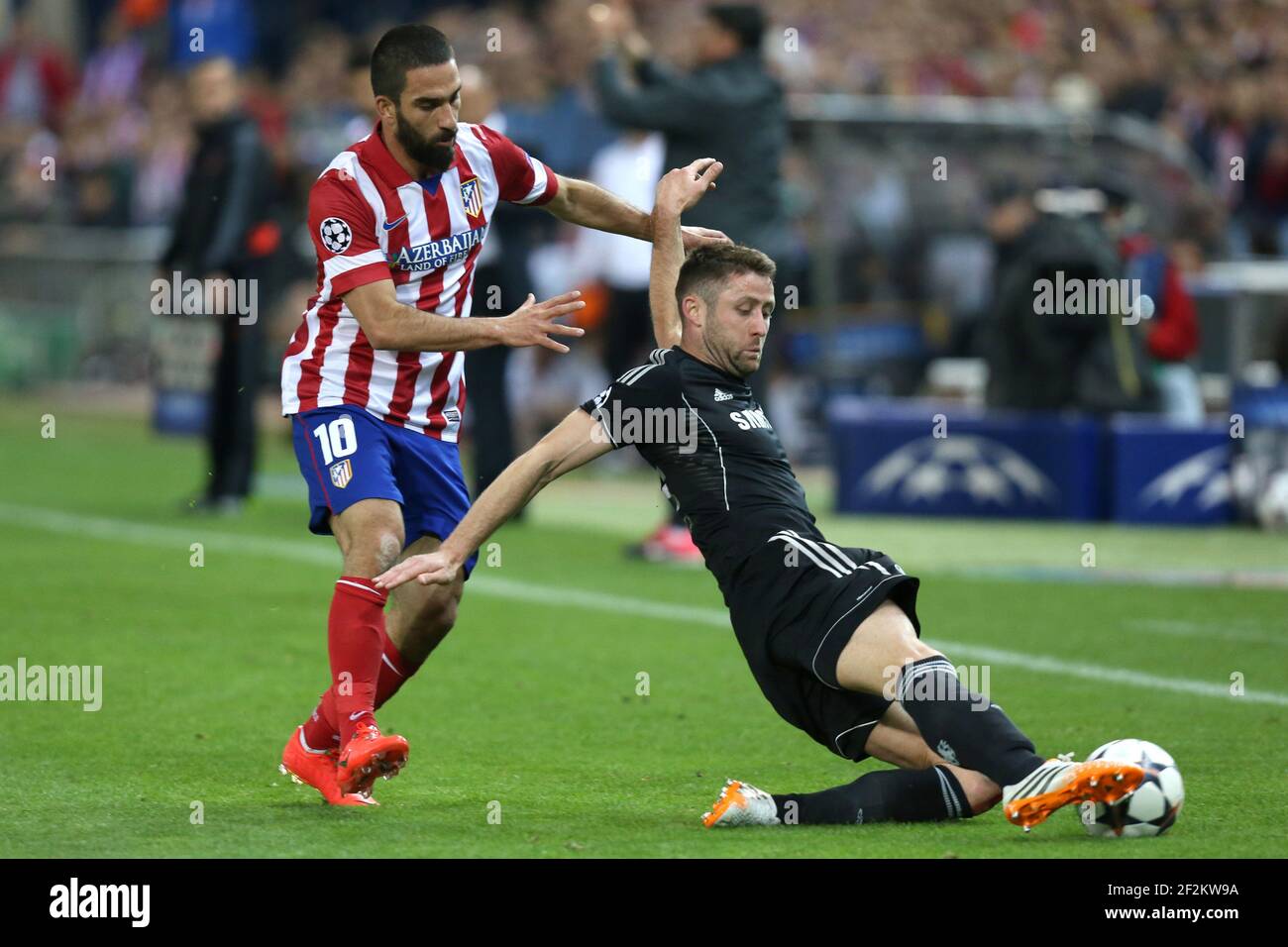 Gary Cahill of Chelsea FC duels for the ball with Arda Turan of Atletico de Madrid during the UEFA Champions League 2013/2014 football match semi final, first leg between Atletico Madrid and Chelsea on April 22, 2014 at Vicente Calderon stadium in Madrid, Spain. Photo Manuel Blondeau / AOP Press / DPPI Stock Photo