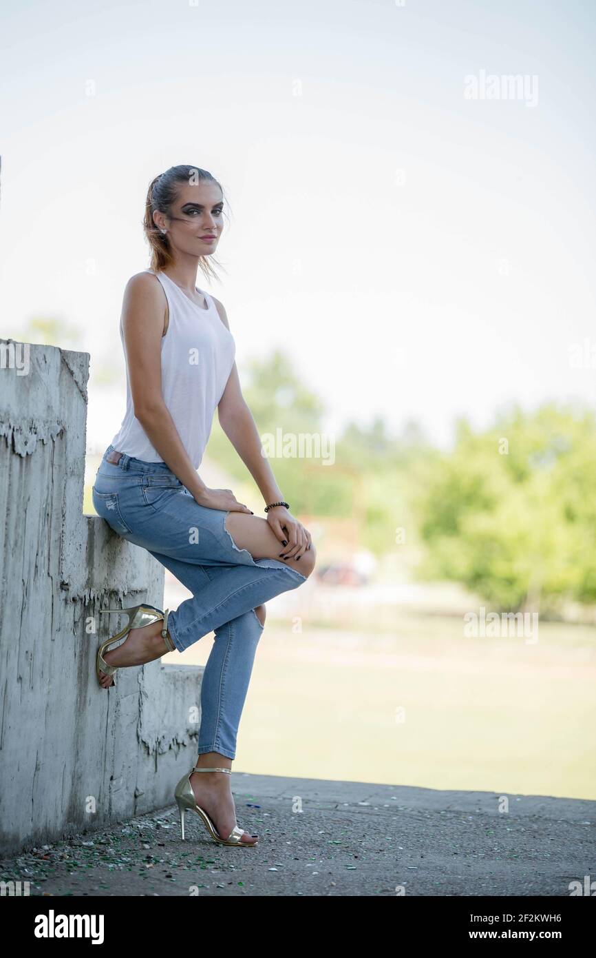 Woman wearing jeans high heels hi-res stock photography and images - Alamy