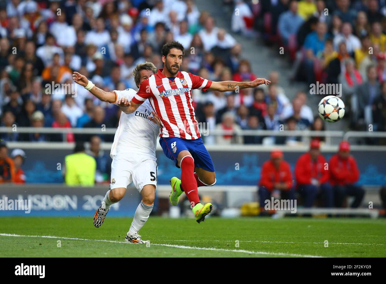 Raul Garcia of Atletico de Madrid duels for the ball with Fabio Coentrao of Real Madrid during the UEFA Champions League 2013/2014 football match final between Real Madrid and Atletico on May 24, 2014 at Luz stadium in Lisbon, Portugal. Photo Manuel Blondeau / AOP Press/ DPPI Stock Photo