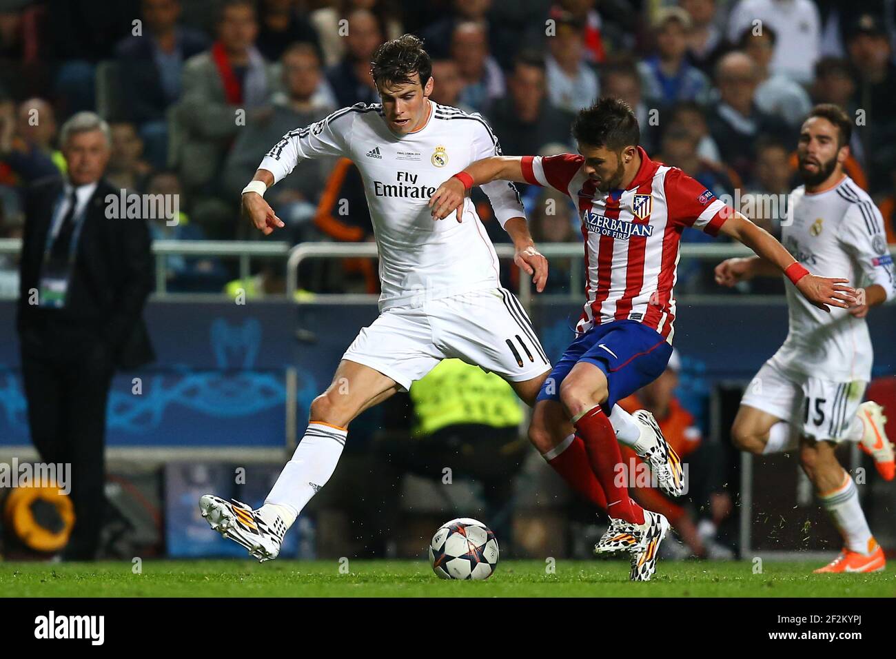 Gareth Bale of Real Madrid duels for the ball with David Villa of Atletico  de Madrid during the UEFA Champions League 2013/2014 football match final  between Real Madrid and Atletico on May