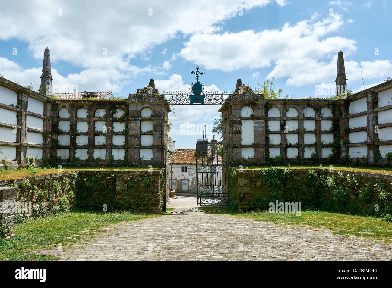MAY 3, 2018 - GALICIA, SPAIN: View of old tombs at the entrance of the cemetery at the Park of San Domingos de Bonaval in Santiago de Compostela. Stock Photo