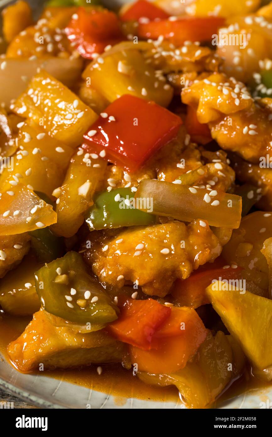 Homemade Chinese Sweet and Sour Chicken with Peppers and Pineapple