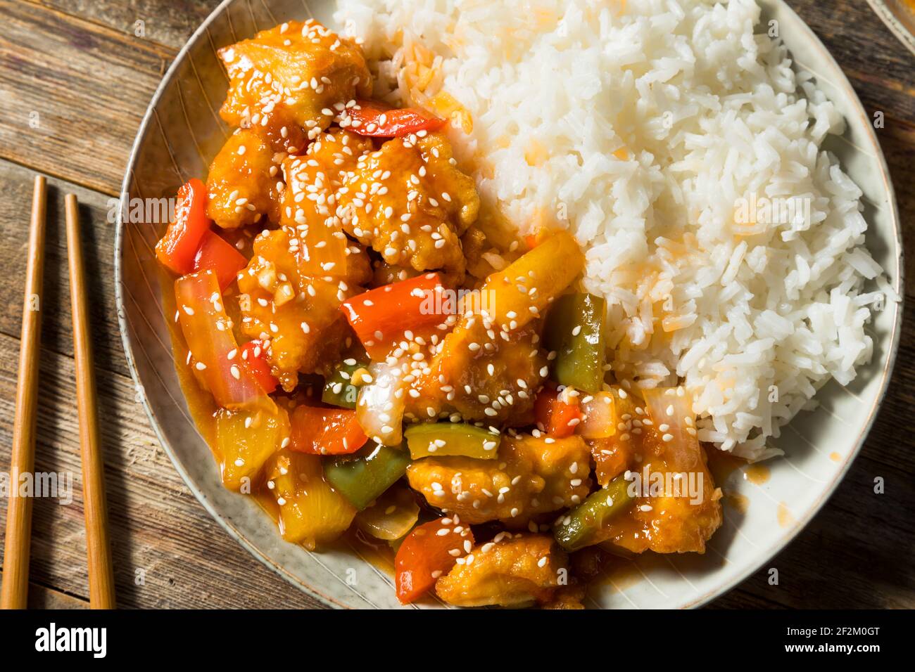 Homemade Chinese Sweet and Sour Chicken with Peppers and Pineapple