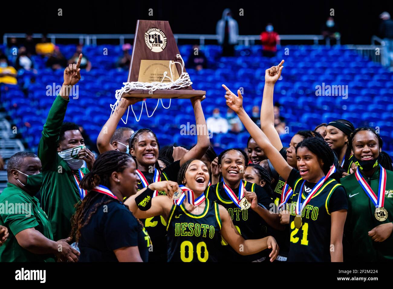 San Antonio, Texas, USA. 11th Mar, 2021. DeSoto celebrates winning the UIL Texas class 6A state title, their 1st, after beating Cypress Creek 53-37 at the Alamodome in San Antonio Texas, on March 11, 2021. Credit: Matthew Smith/ZUMA Wire/Alamy Live News Stock Photo