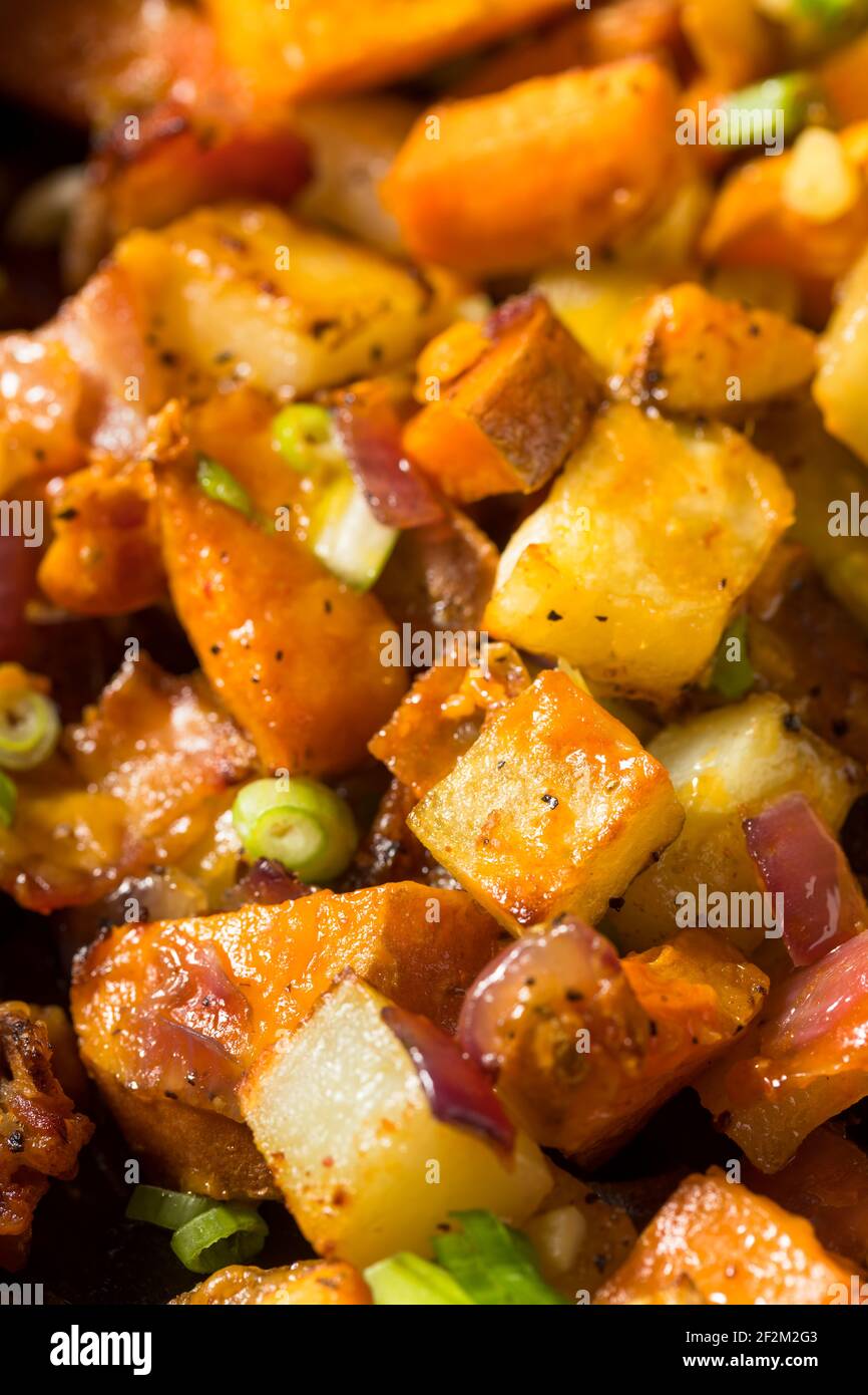 Homemade Healthy Sweet Potato Hash with Fried Eggs Stock Photo Alamy