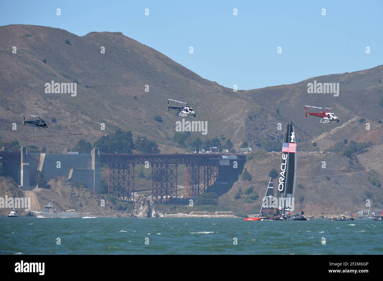 Challenger Emirates Team New Zealand practices on day seven of the America's Cup 34 sailing off San Francisco (West USA), September the 18th, 2013 - Photo : Christophe Favreau / DPPI - Media helicopters fly above Stock Photo