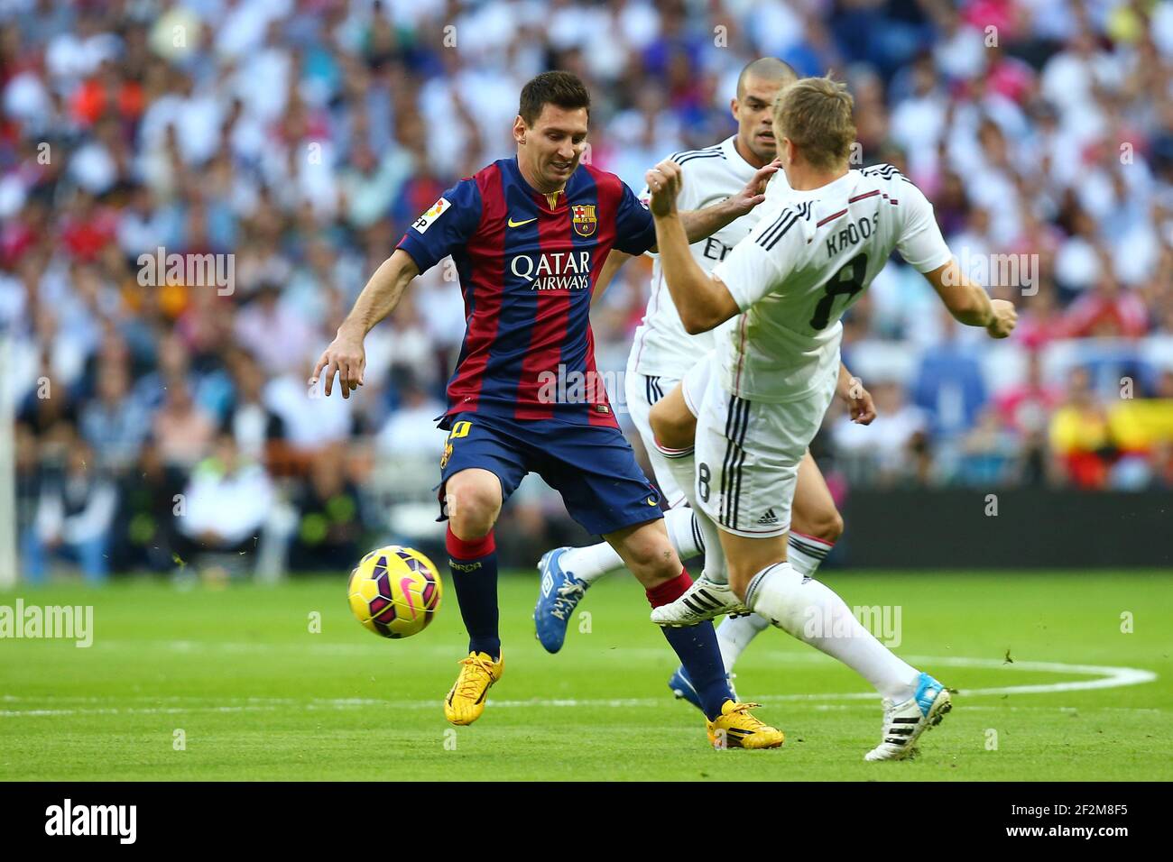 Lionel Messi of FC Barcelona duels for the ball with Toni Kroos of Real Madrid during the Spanish Championship Liga football match between Real Madrid CF and FC Barcelona, at Santiago Bernabeu Stadium in Madrid, Spain, on October 25, 2014. Photo Manuel Blondeau / AOP.press / DPPI Stock Photo