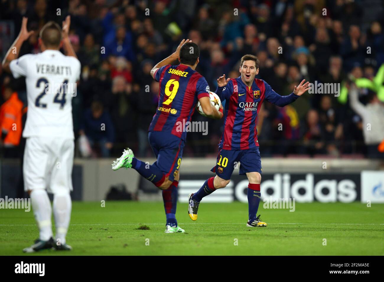 Lionel Messi of FC Barcelona celebrates with Luis Suarez after scoring his side's opening goal during the UEFA Champions League, Group F, football match between FC Barcelona and Paris Saint Germain on December 10, 2014 at Camp Nou stadium in Barcelona, France. Photo Manuel Blondeau / AOP PRESS / DPPI Stock Photo