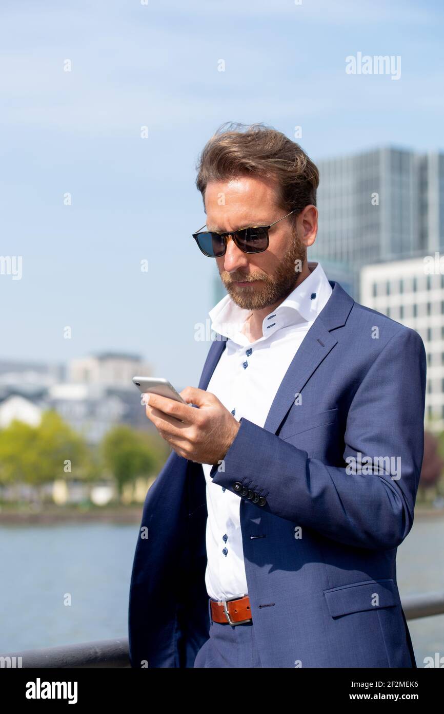 man working outside in Frankfurt Main, Germany Stock Photo