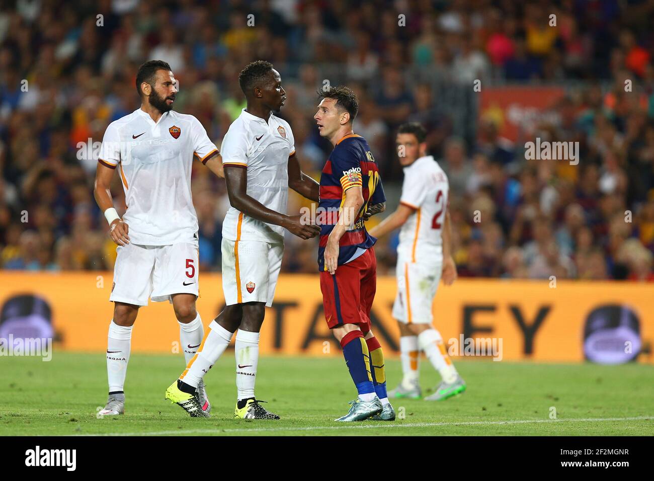 Lionel Messi Of Fc Barcelona Argues With Mapou Yanga Mbiwa Of As Roma