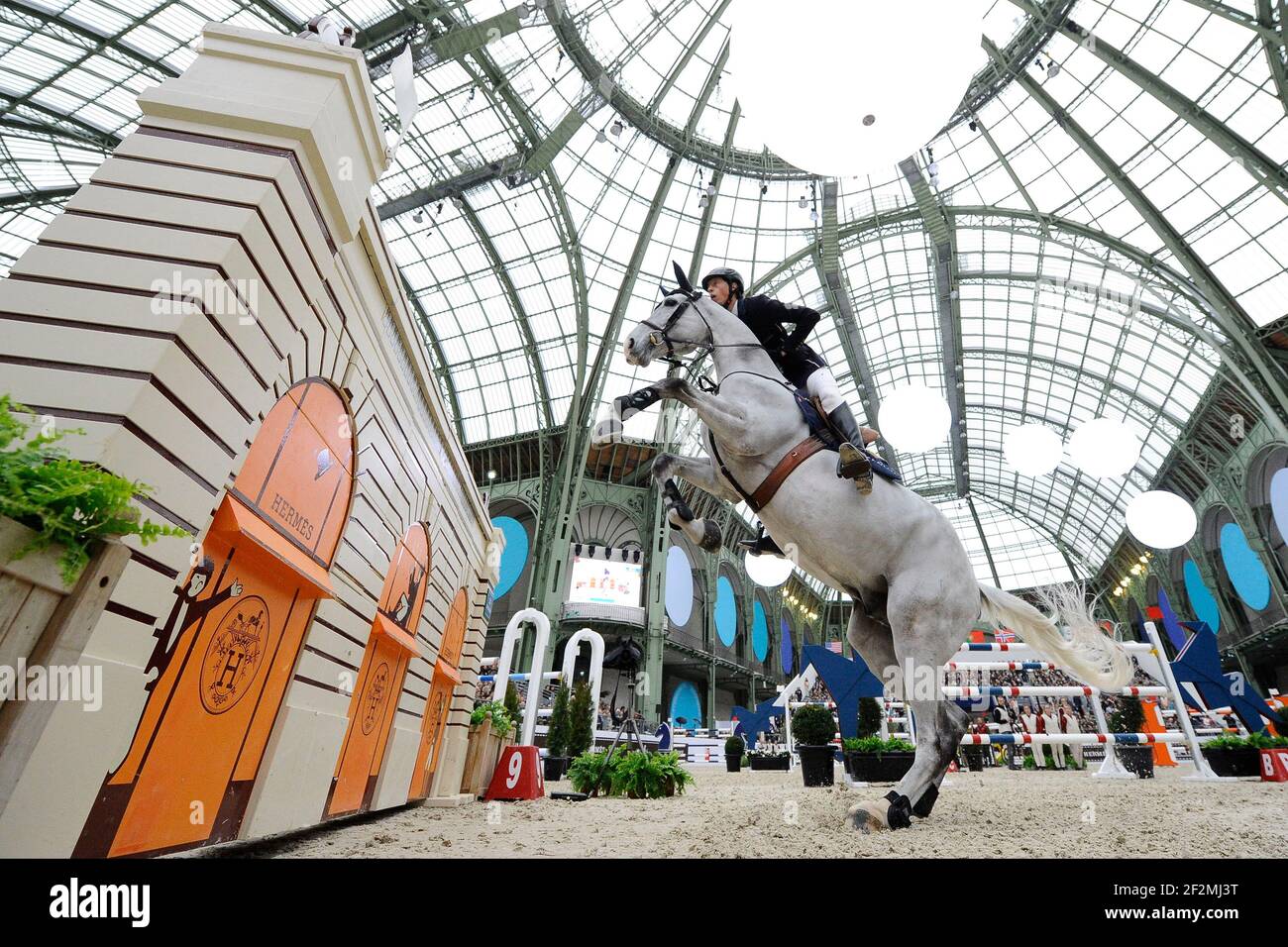 Martin FUCHS riding Clooney 51 during the Grand Prix of the Saut-Hermès , Grand-Palais, on March 20th , 2016, in Paris, France - Photo Christophe Bricot / DPPI Stock Photo