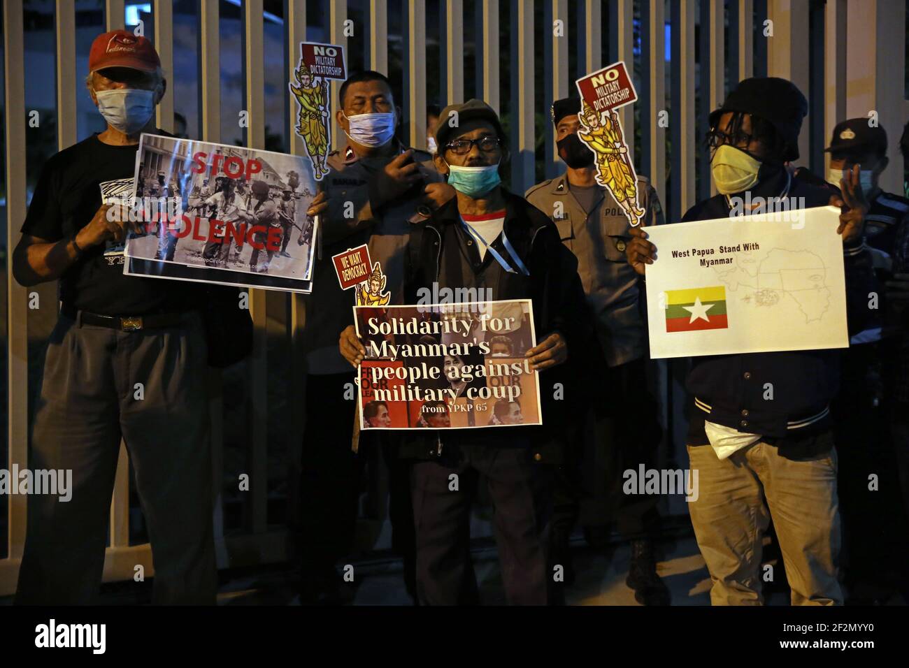 Activist holding placards against the military coup during the   activists held solidarity demonstration in front of  the ASEAN Office (Association of South-East Asian Nations). This action was  to show support to