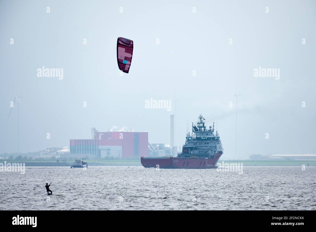 Germany, East Friesland, Dollart, kite surfers on the Dollart. Stock Photo