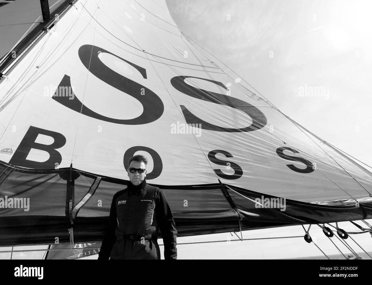 SAILING - ARTEMIS CHALLENGE - AROUND THE ISLE OF WIGHT - GREAT BRITAIN - 10/08/2011 - PHOTO : CHRISTOPHE LAUNAY / DPPI - Onboard Hugo Boss - Skipper Alex Thomson & Crew along with celebrity Ewan McGregor (Actor) Stock Photo