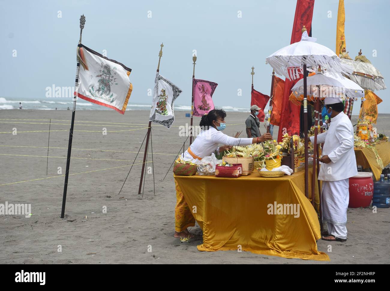 People in Yogyakarta carry out the Melasti ceremony, adhering to various health protocols due to Covid 19. Melasti is a Hindu Balinese purification ce Stock Photo
