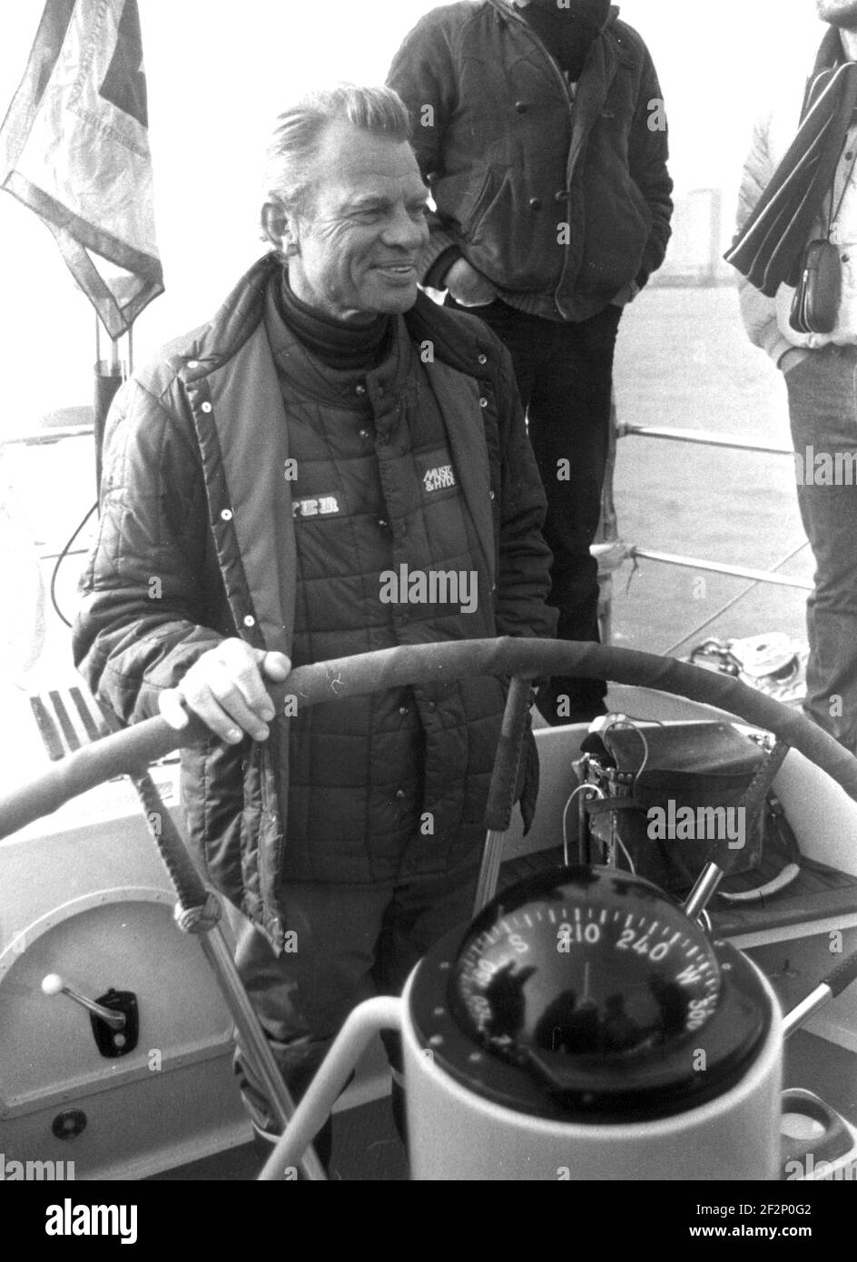 SKIPPER OF FLYER WHICH WON THE 1981 ROUND THE WORLD YACHT RACE        CORNELIUS VAN RIETSCHOTEN STEERS THE YACHT ACROSS THE FINISHING LINE. EXCLUSIVE PIC,MIKE WALKER, Stock Photo