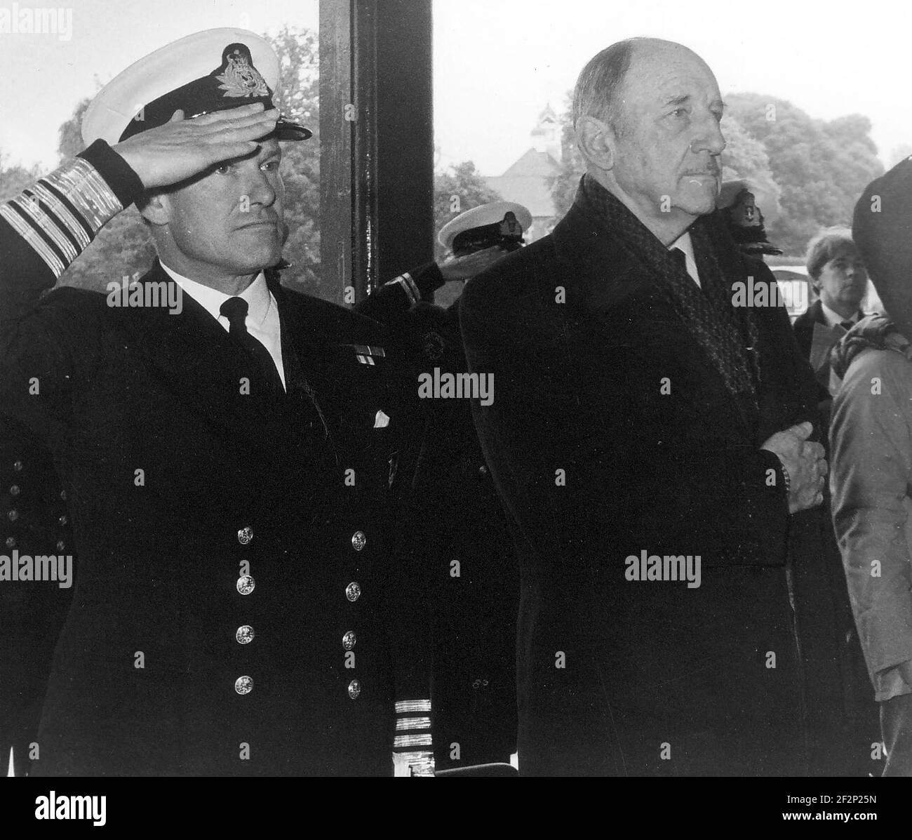 CHANGE OF COMMAND CEREMONY FOR NATO STANDING FORCE CHANNEL., DR. JOSEPH LUNS (SECRETARY GENERAL NATO)   AND COMMANDER R.C. MOORE ( NEW COMMANDER NATO STANDING FORCE CHANNEL. PIC MIKE WALKER,  1984. Stock Photo