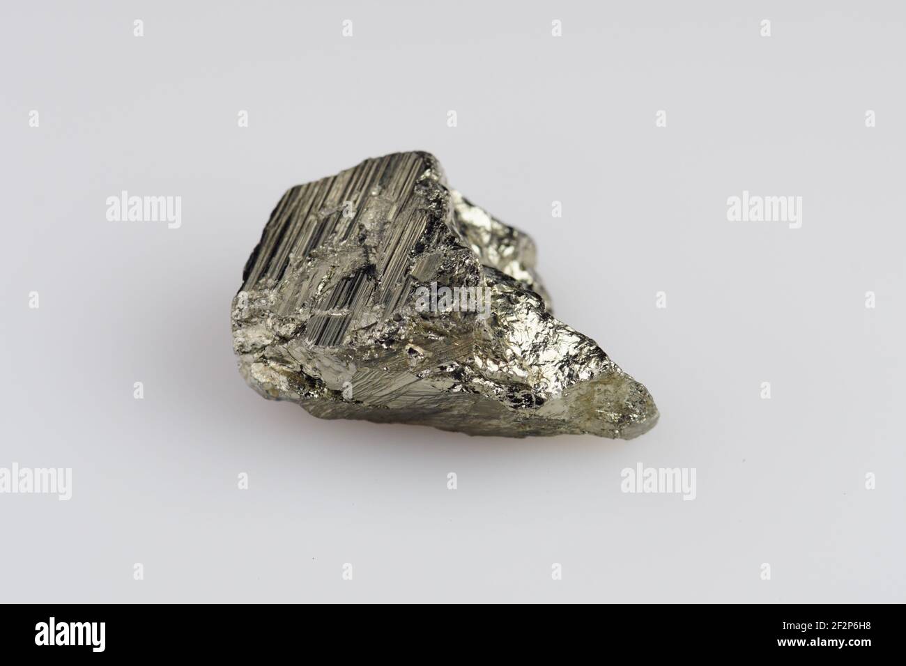 Natural pyrite on white background Stock Photo - Alamy