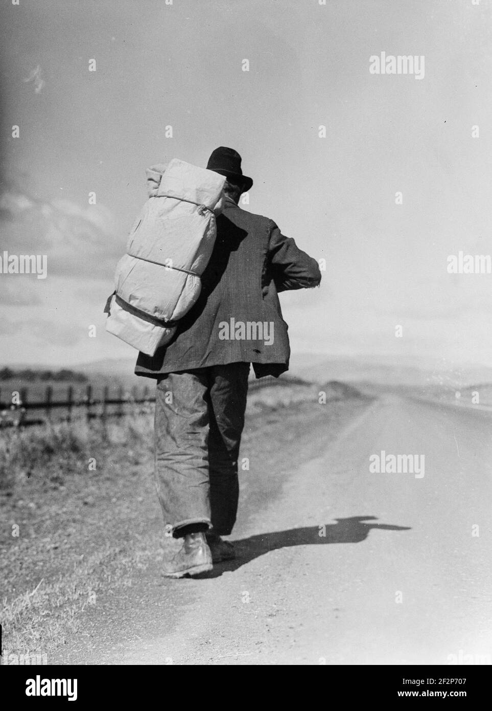 Migrant worker on California highway. 1935 . Photograph by Dorothea Lange. Stock Photo
