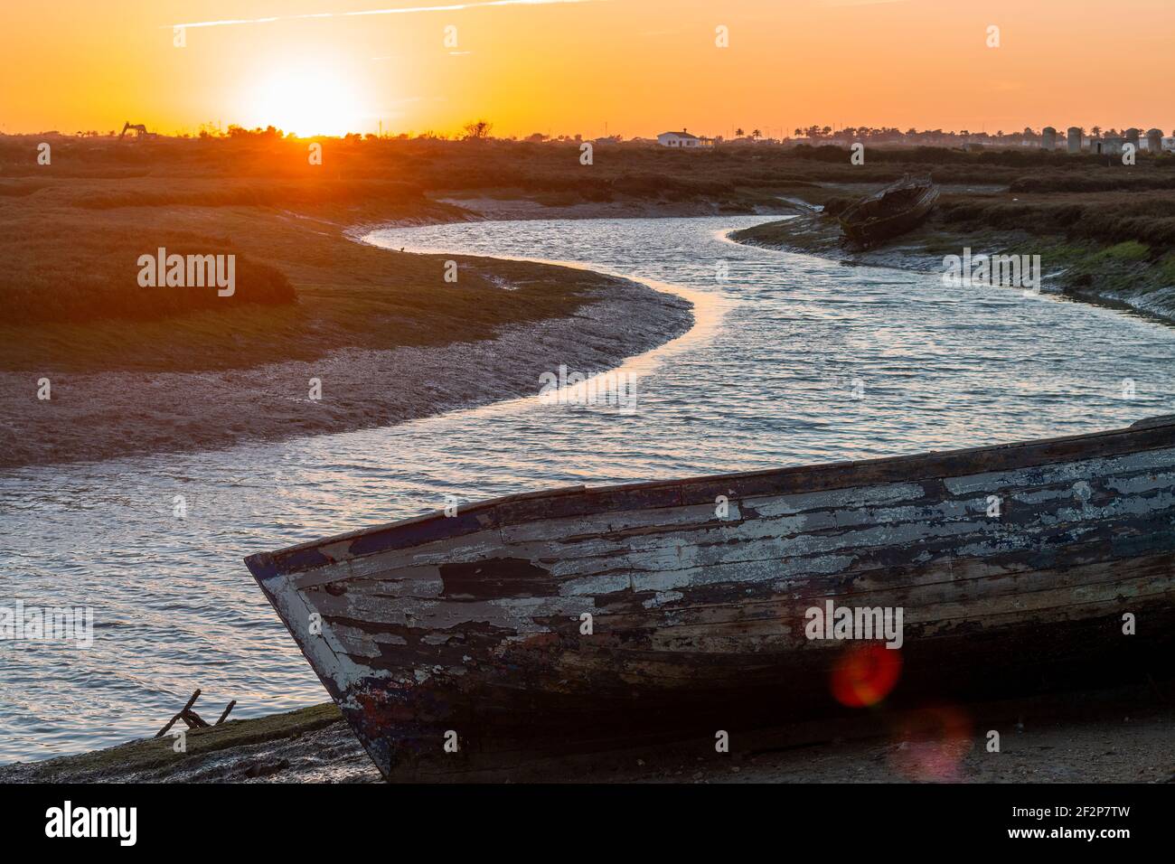 Stunning sunset in the marshes of Chiclana de la Frontera, Spain Stock Photo