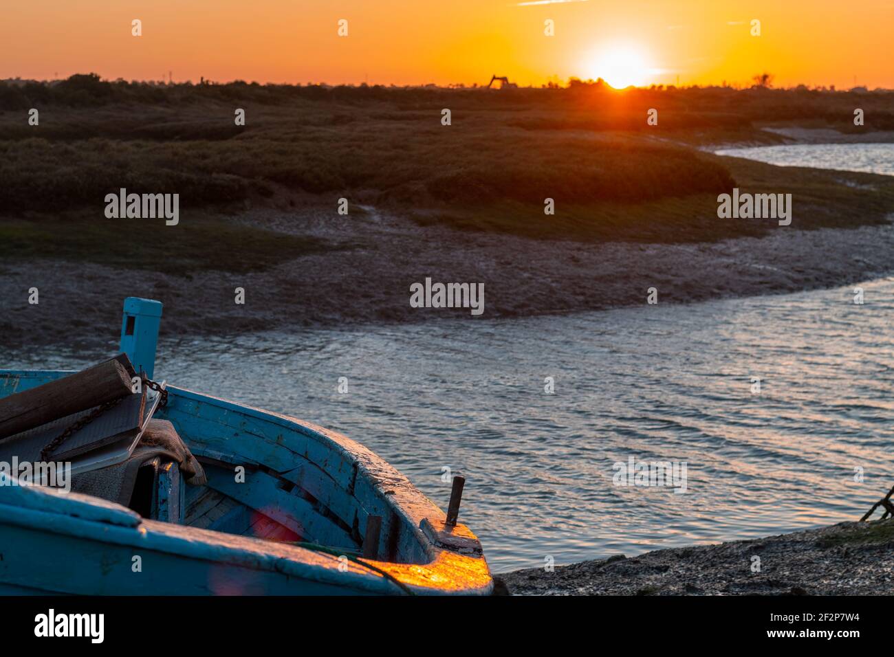 Dramatic sunset in the marshes of Chiclana de la Frontera, Spain Stock Photo