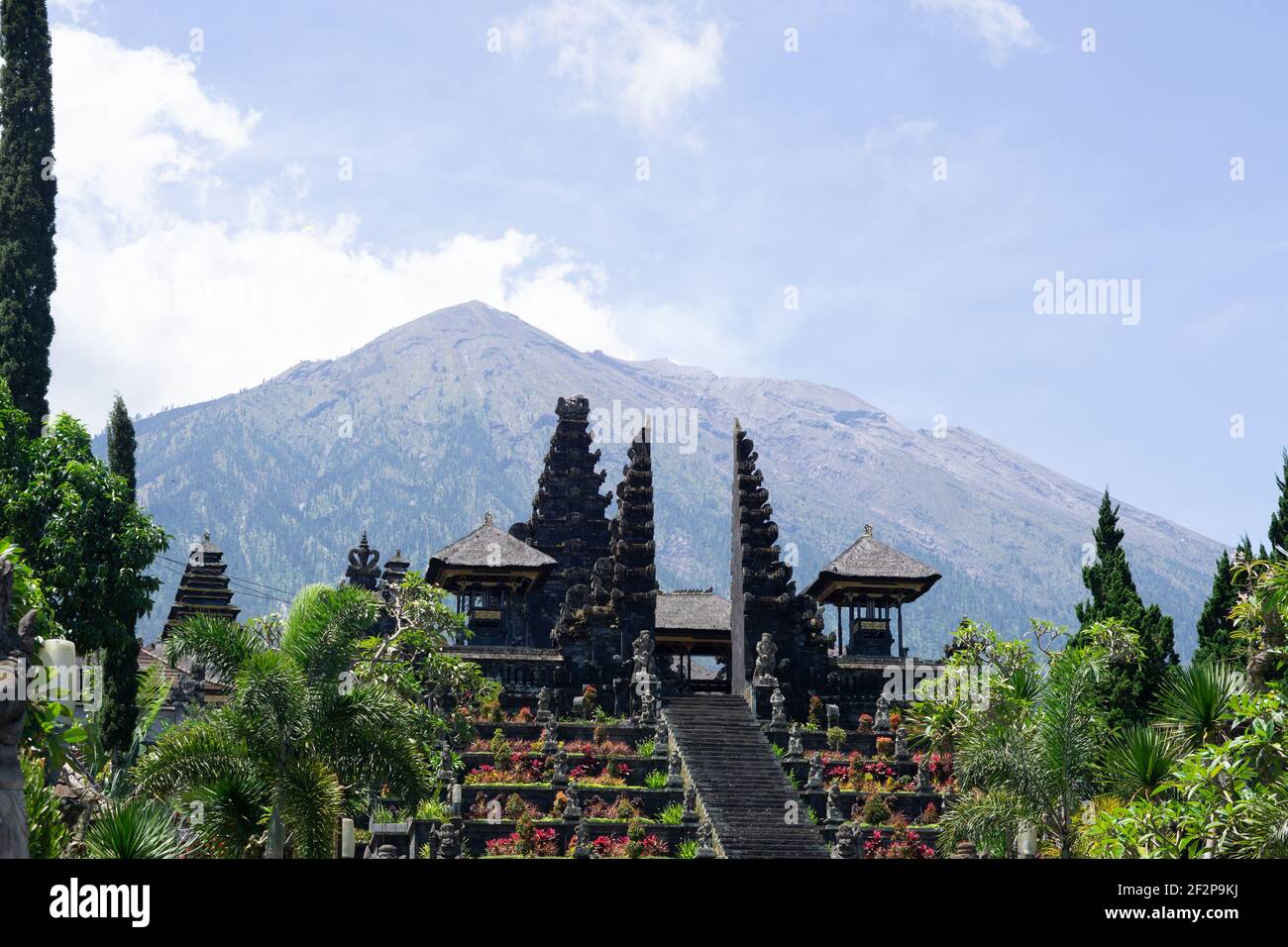 Photo of Besakih temple during the day of the pandemic which is quiet with tourists and a mountain background located in Bali, Indonesia. Stock Photo