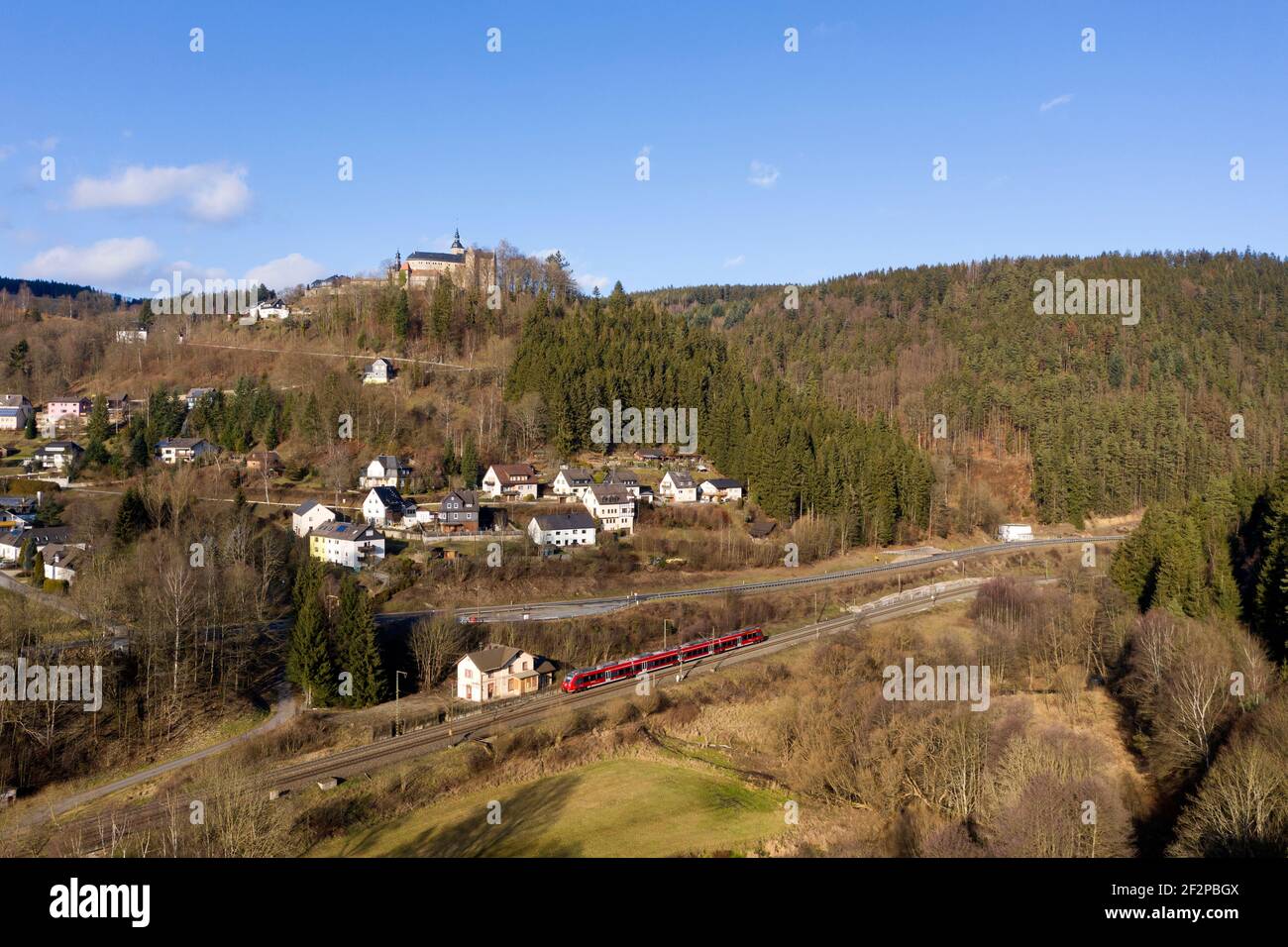 Germany, Bavaria, Lauenstein, train, forest, landscape, castle, houses, aerial view Stock Photo