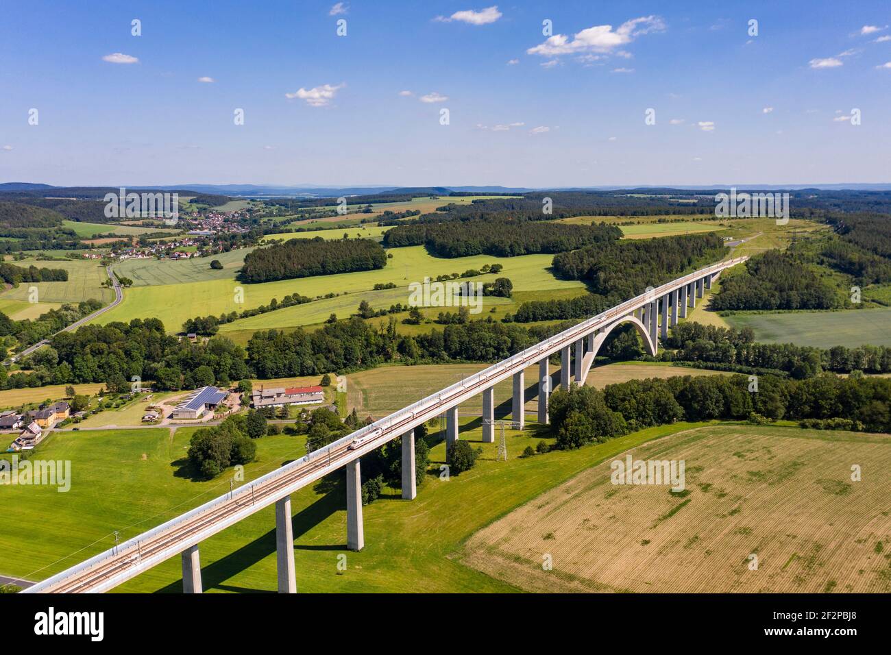 ICE, bridge (1104 m long, 71 m high), fields, forests, hilly landscape, aerial view Stock Photo