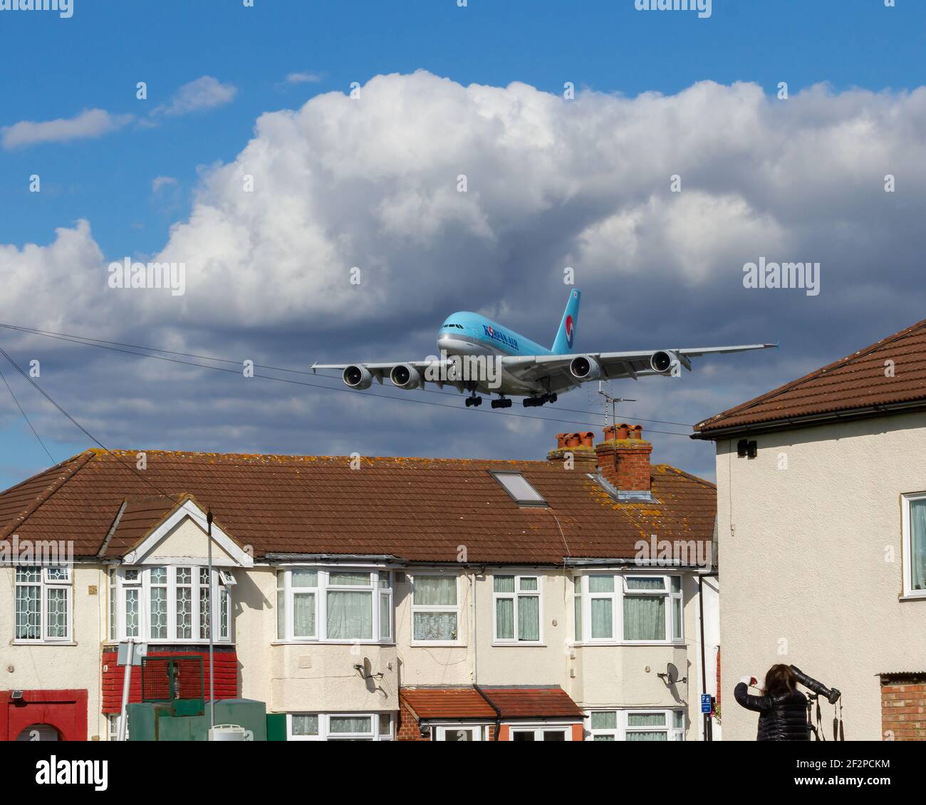 London, Heathrow Airport - August 2017: Korean Airlines, Airbus A380 on final approach flying over residential homes. image Abdul Quraishi Stock Photo