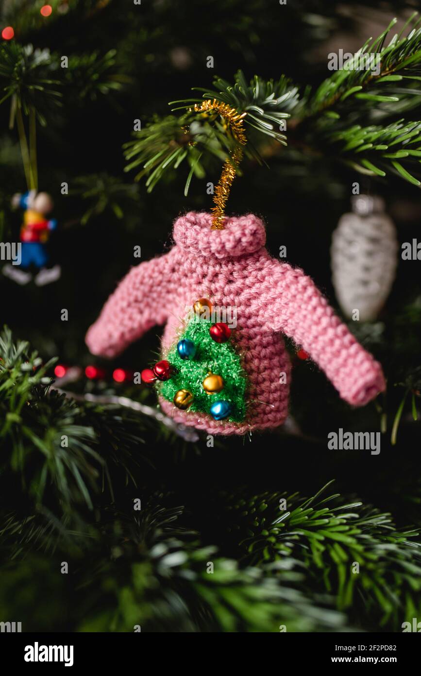 pink Christmas sweater tree pendant, self-crocheted tree decorations Stock Photo