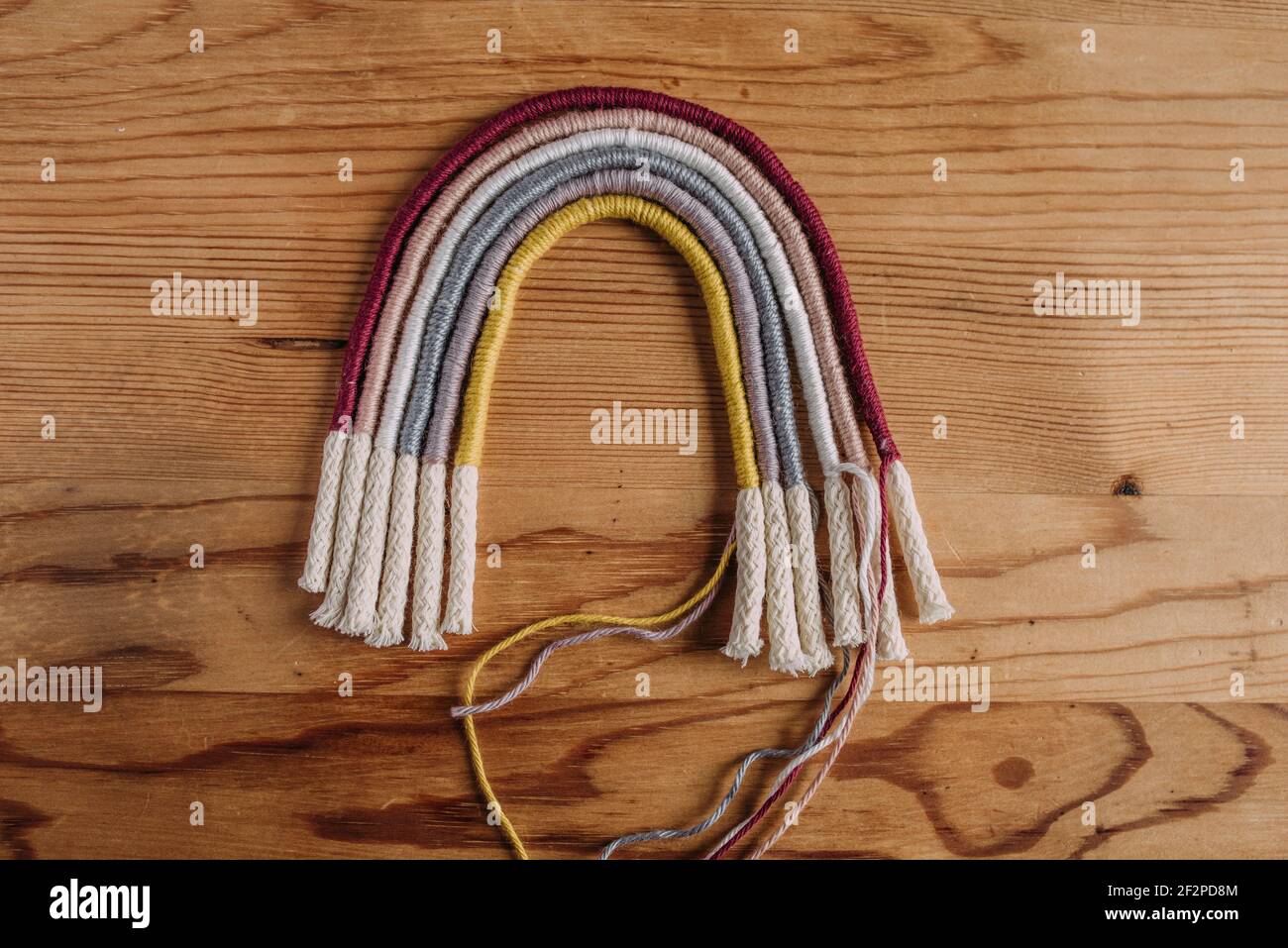 Macrame rainbow, step-by-step 3 - ready-wrapped cords Stock Photo