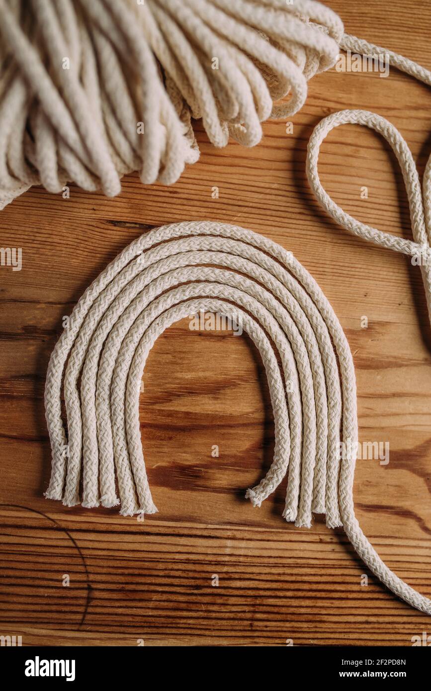 Macrame rainbow, stepbystep, 1 cut the cords to size Stock Photo