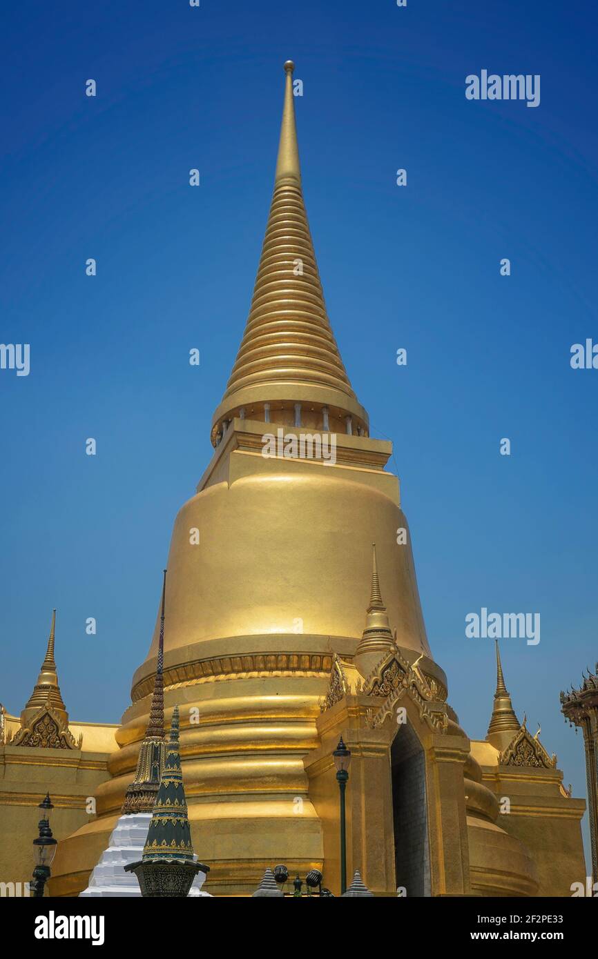 Photo of the golden tower at the grand palace in Bangkok Thailand Stock Photo